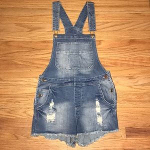Distressed overall denim shorts